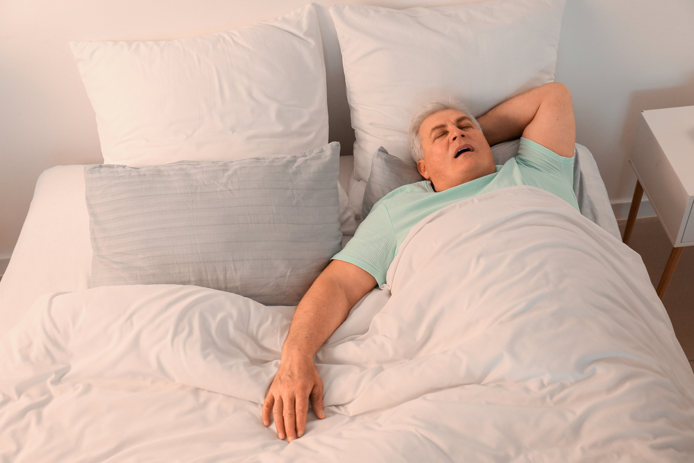Man snoring due to sleep apnea in West Orange, NJ
